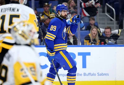 Buffalo Sabres forward Alex Tuch celebrates during 2025 game.